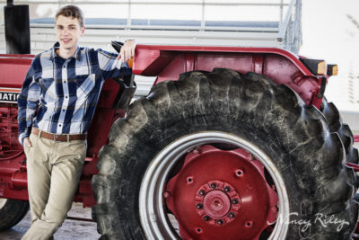 Senior boy with tractor