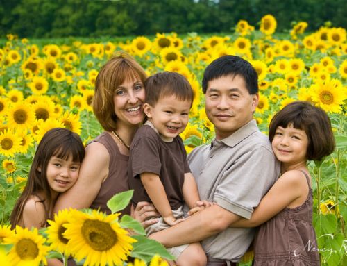 Family portrait in sunflower field