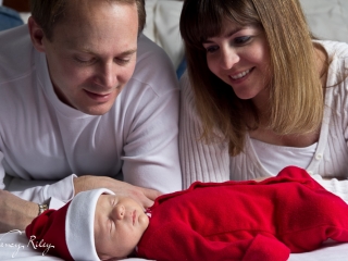 Christmas baby with parents