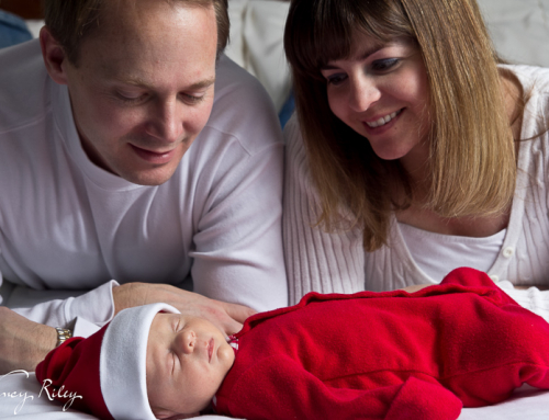 Christmas baby with parents
