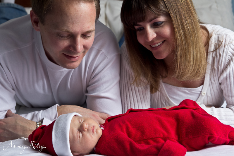 Christmas baby with parents