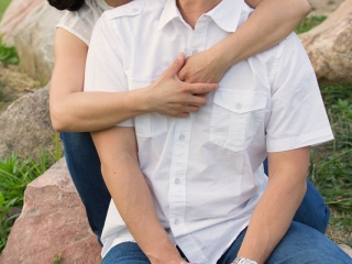 couple with woman laughing