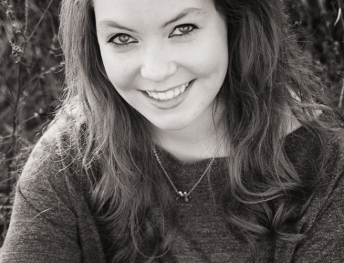 Senior sitting in field