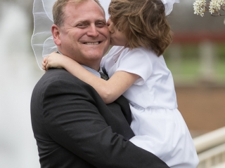 First Communion girl and dad