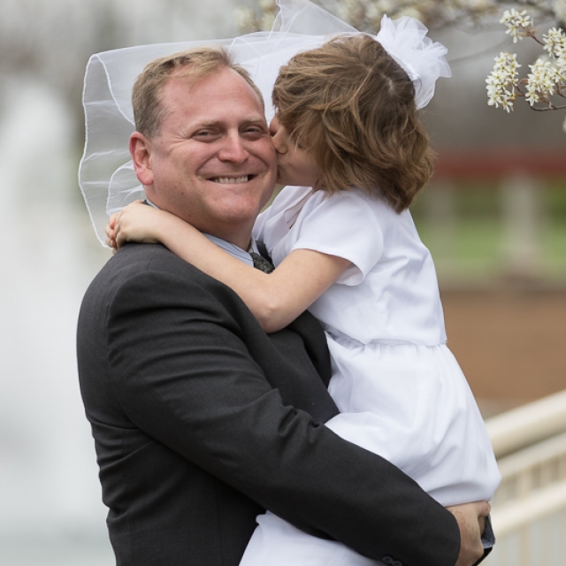 First Communion girl and dad
