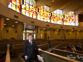 First Communion Andrew in church