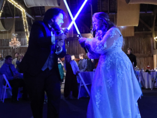 Wedding light saber duel