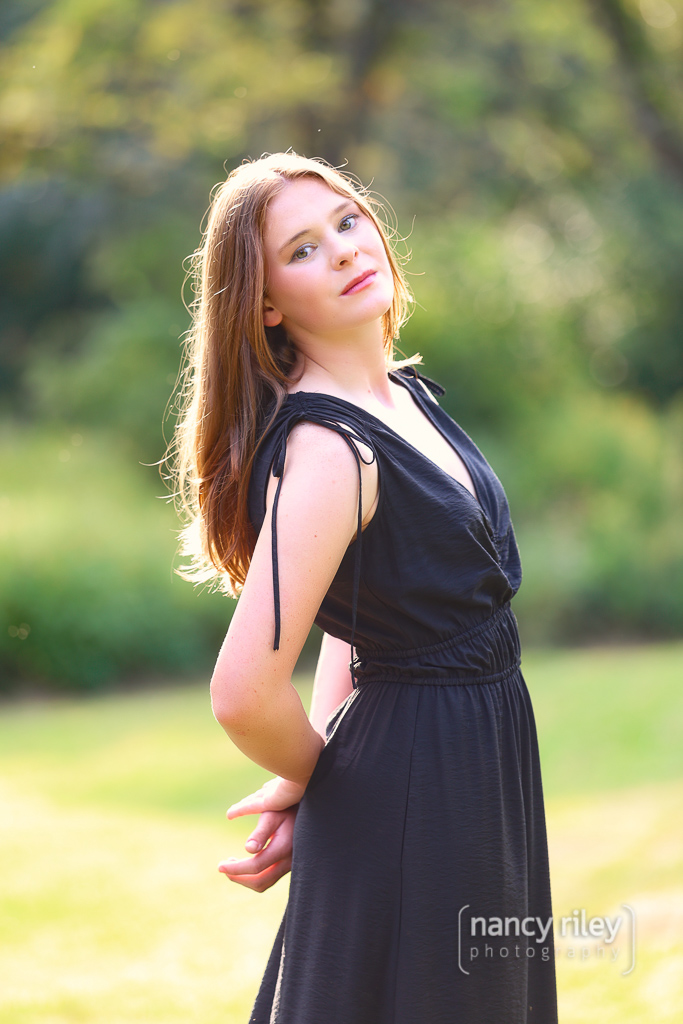Senior girl on hillside Senior girl on hillside