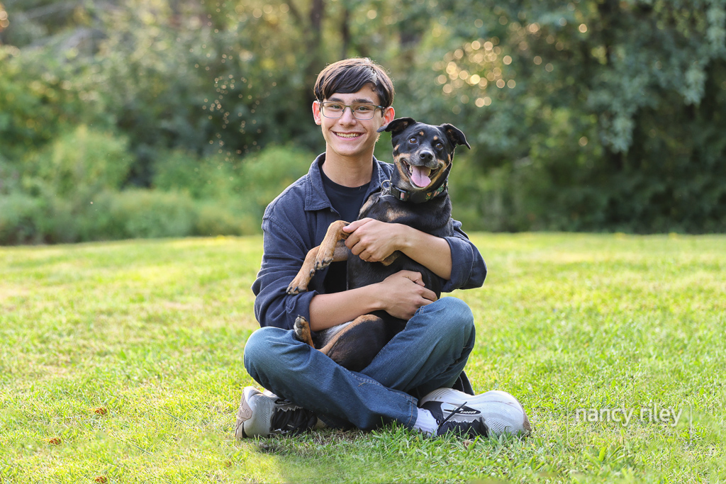 Senior boy with his dog Senior boy with his dog