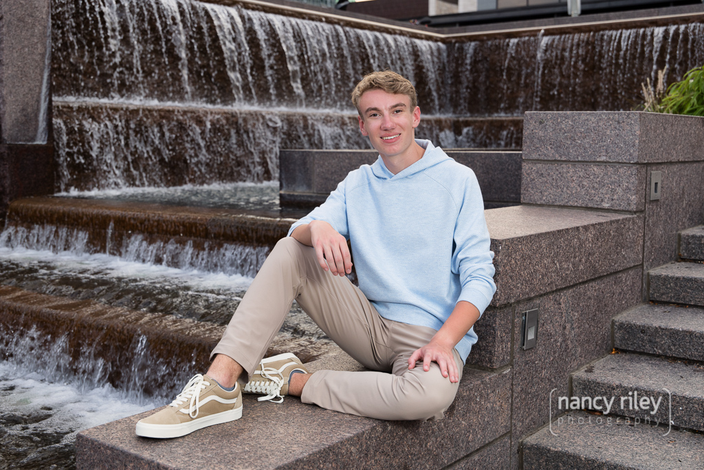 Senior portrait in front of fountains Senior portrait in front of fountains