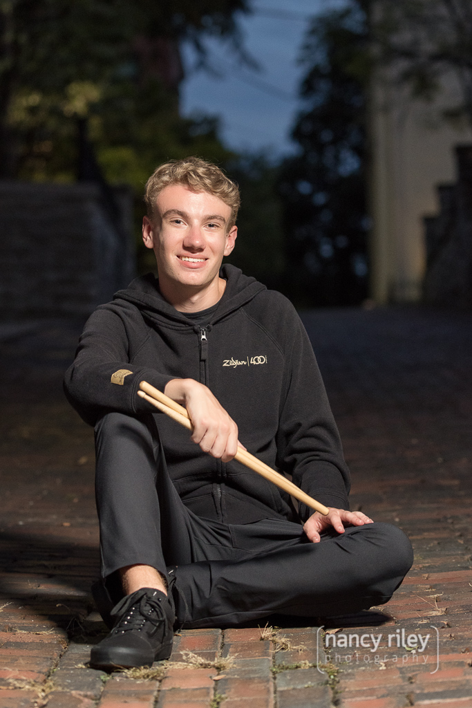 Senior portrait with drumsticks Senior portrait with drumsticks