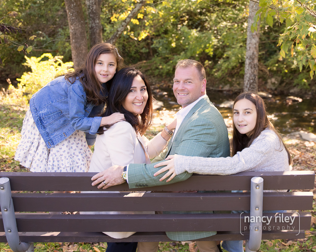 Family on park bench Family on park bench
